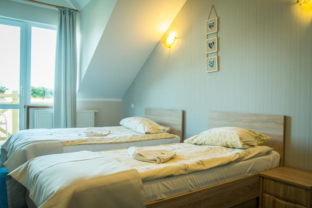 Sloneczny Port Bed and Breakfast Mikołajki Δωμάτιο φωτογραφία