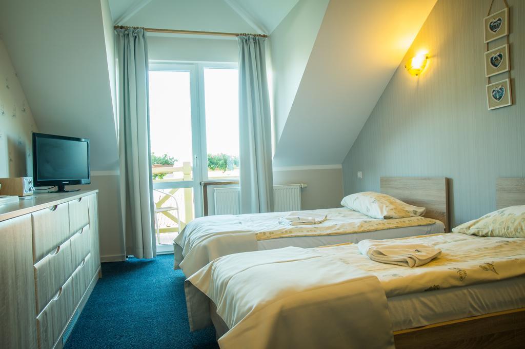 Sloneczny Port Bed and Breakfast Mikołajki Δωμάτιο φωτογραφία
